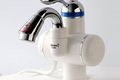 Як вибрати електричний проточний водонагрівач у будинок? фото